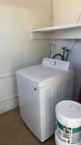 an empty room with wooden floor