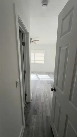 a bathroom with a sink a toilet and a shower