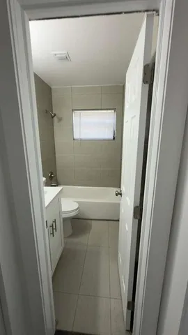 a view of a yard with swimming pool