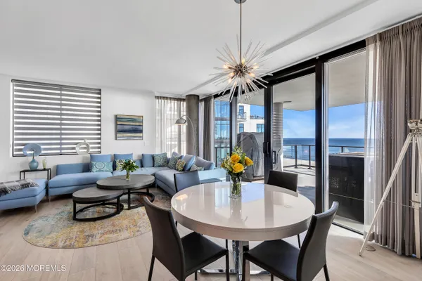 a bedroom with a bed and a view of kitchen