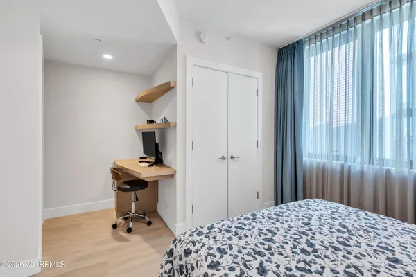 a room with gym equipment and lots of equipment