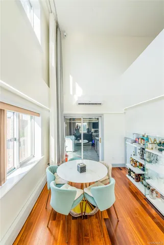 a dining room with table and chairs