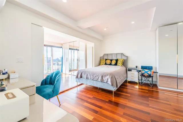 a spacious bathroom with a bathtub and a sink
