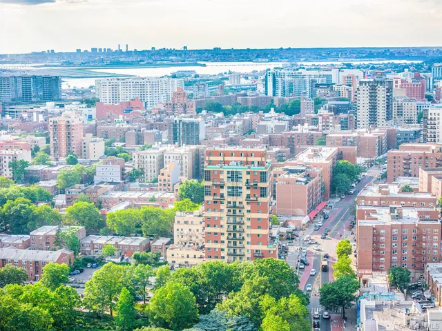 a view of a city with tall buildings