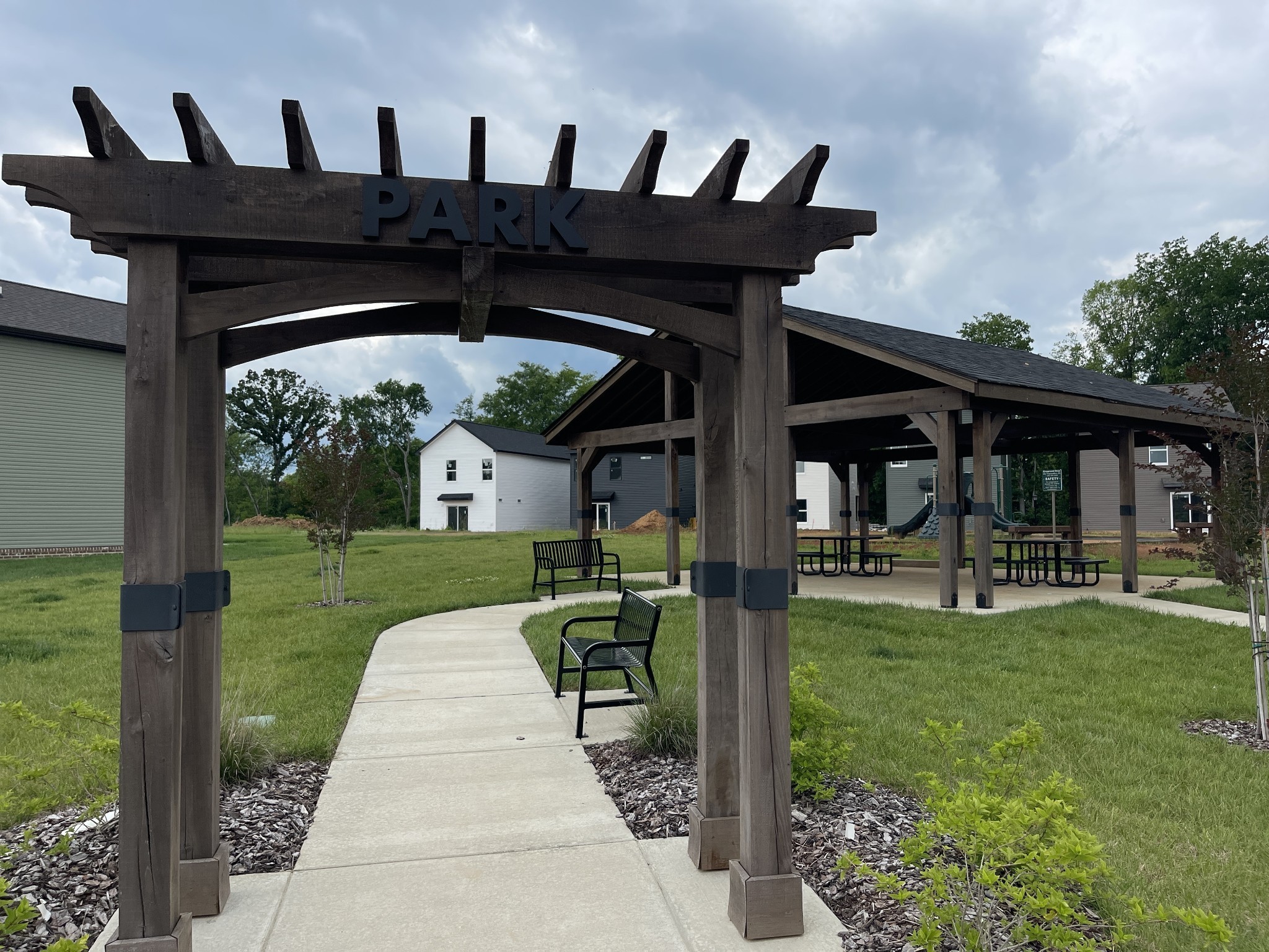 620 Southern Pass Run Clarksville, TN 37043 - Photo 21 of 21 a front view of a house with a yard table and chairs