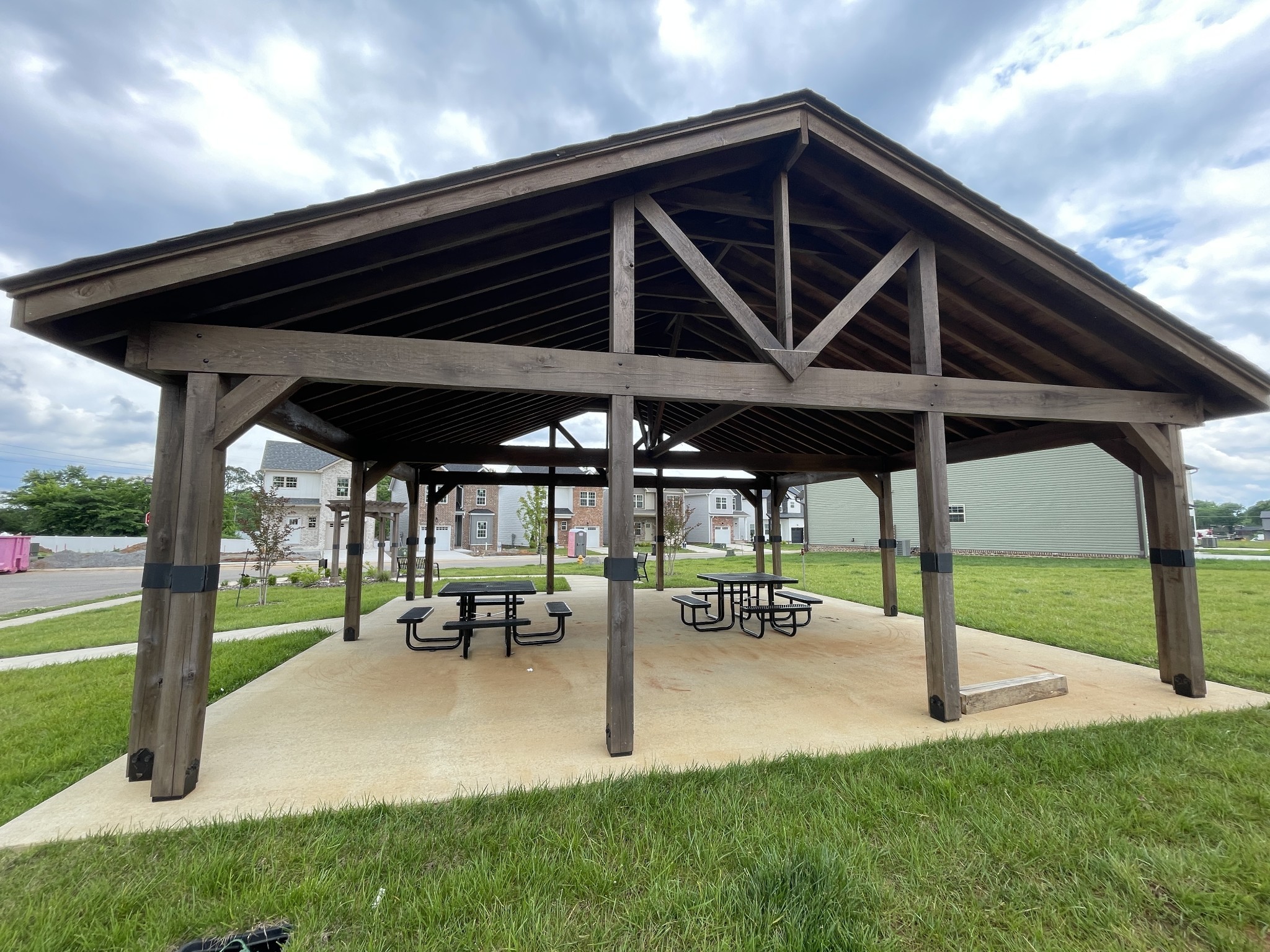 620 Southern Pass Run Clarksville, TN 37043 - Photo 6 of 22 a view of a patio with table and chairs under an umbrella