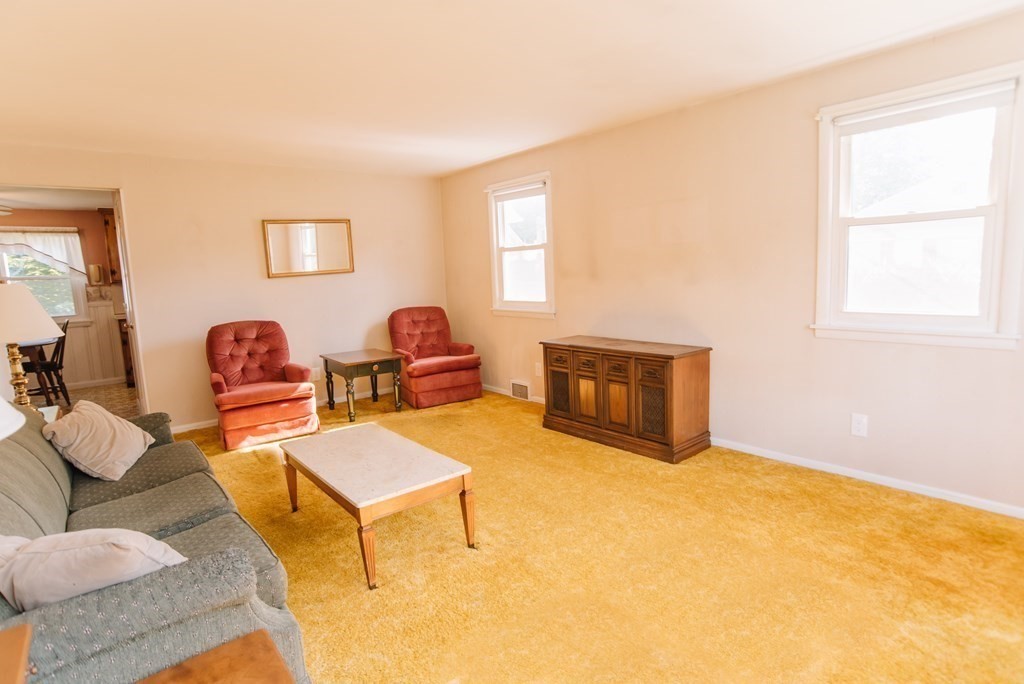 37 Timothy Circle Springfield, MA 01119 - Photo 18 of 37 a living room with furniture a rug and a window