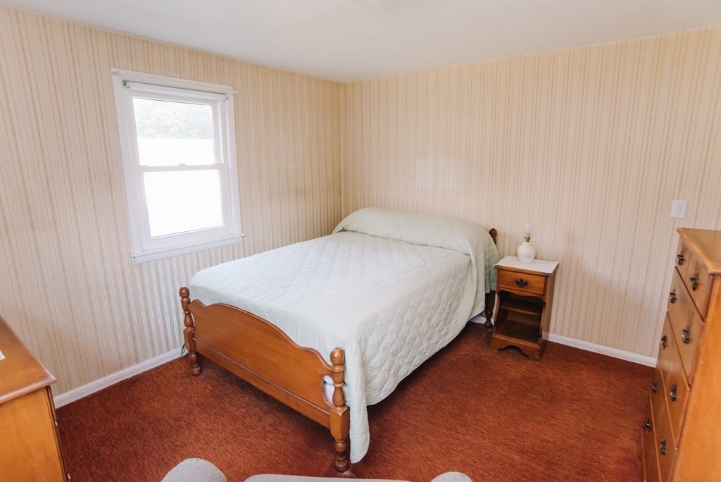37 Timothy Circle Springfield, MA 01119 - Photo 24 of 37 a bed sitting in a bedroom next to a window
