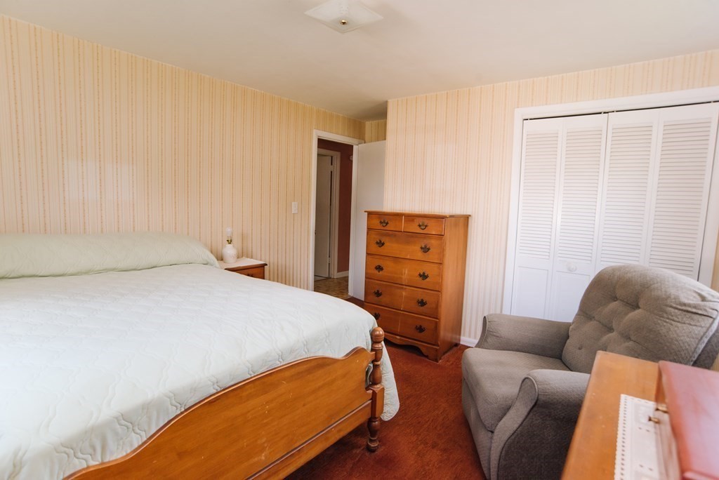37 Timothy Circle Springfield, MA 01119 - Photo 27 of 37 a bedroom with a bed and a couch