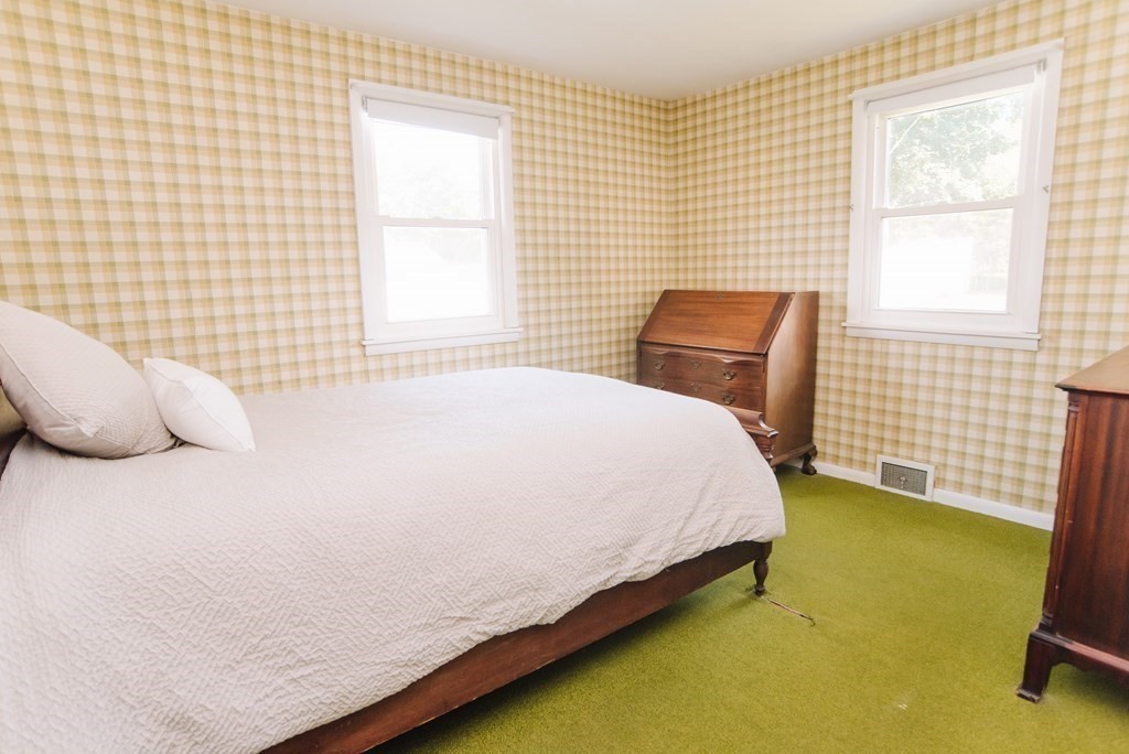 37 Timothy Circle Springfield, MA 01119 - Photo 28 of 37 a bed sitting in a bedroom next to a window