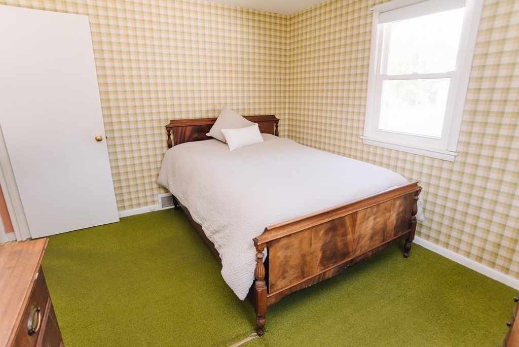 37 Timothy Circle Springfield, MA 01119 - Photo 29 of 37 a bed sitting in a bedroom next to a window