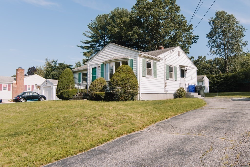 37 Timothy Circle Springfield, MA 01119 - Photo 31 of 37 a front view of a house with a yard and garage