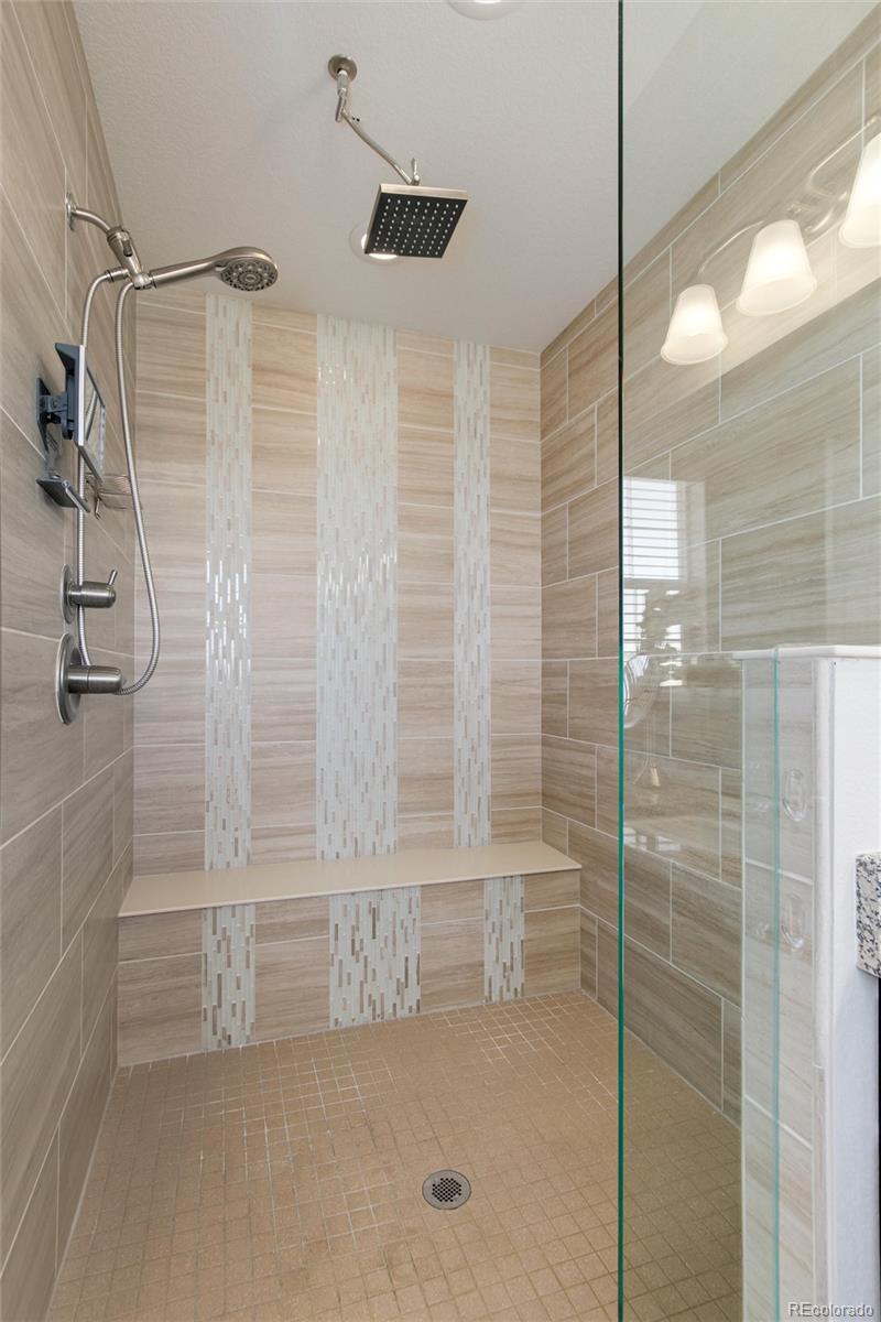 1165 Brocade Drive Highlands Ranch, CO 80126 - Photo 26 of 40 a bathroom with a shower