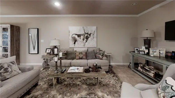 a living room with furniture or couch and a flat screen tv