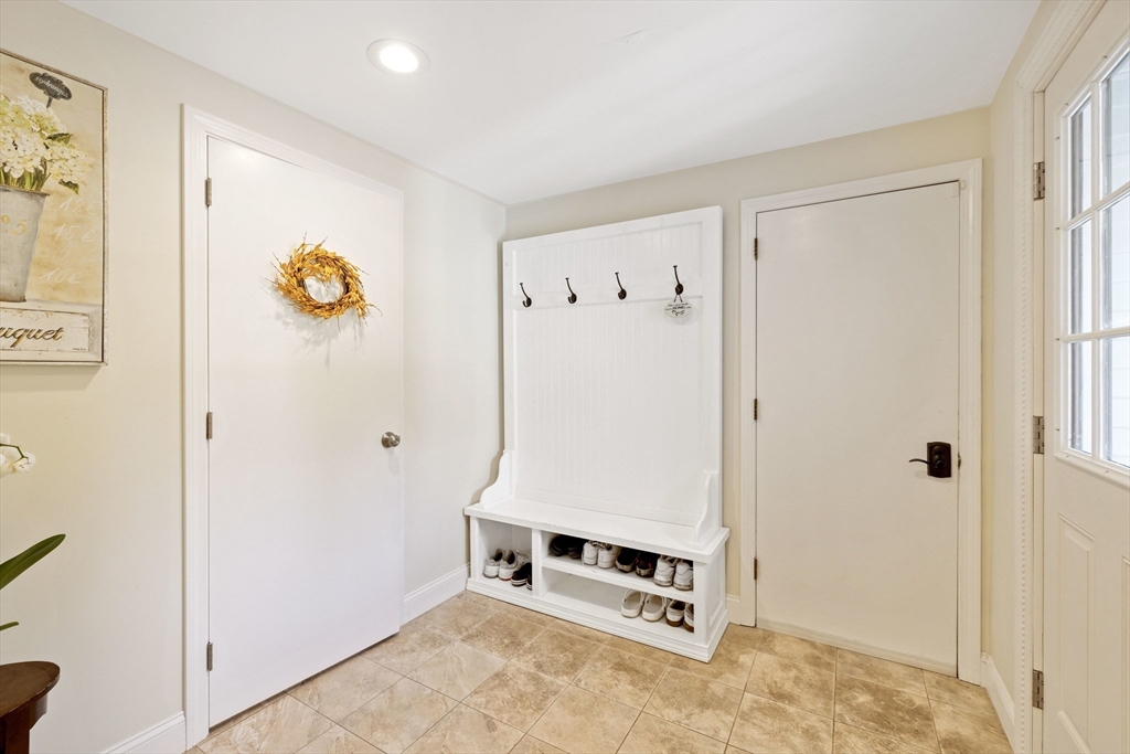 3 Hadley Road Lexington, MA 02420 - Photo 13 of 30 a room with a door and mirror
