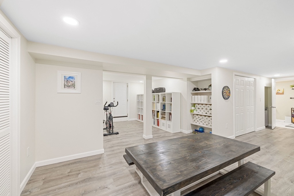 3 Hadley Road Lexington, MA 02420 - Photo 25 of 30 wooden floor with windows and hardwood floor