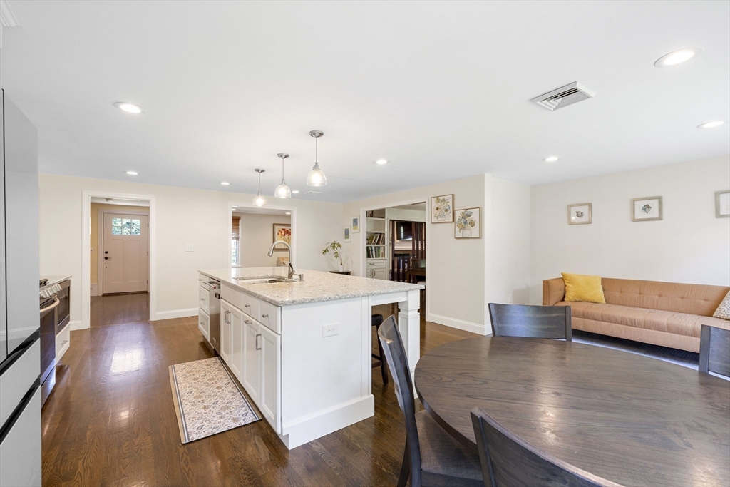 3 Hadley Road Lexington, MA 02420 - Photo 6 of 30 a open kitchen with white cabinets and stainless steel appliances