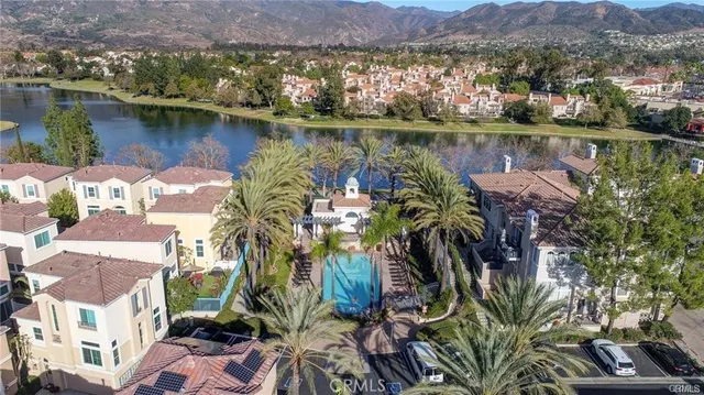 an aerial view of residential house with outdoor space and river