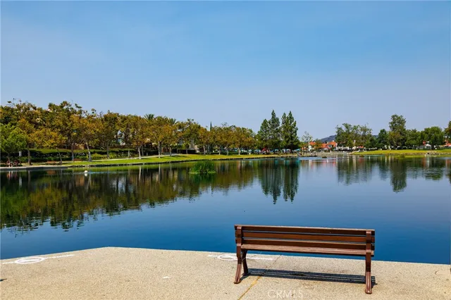 a view of a lake in a forest