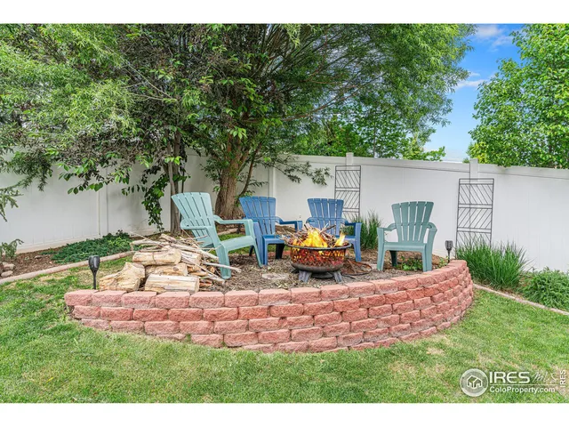 a view of a backyard with a patio