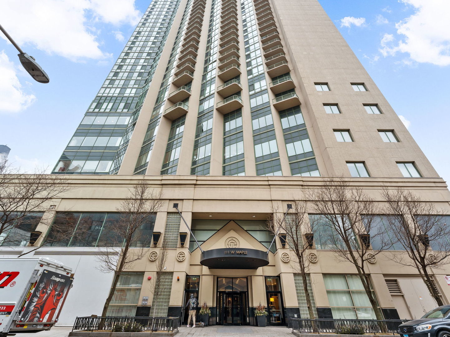 111 West Maple Street, Unit 1401 Chicago, IL 60610 - Photo 21 of 22 a front view of a building