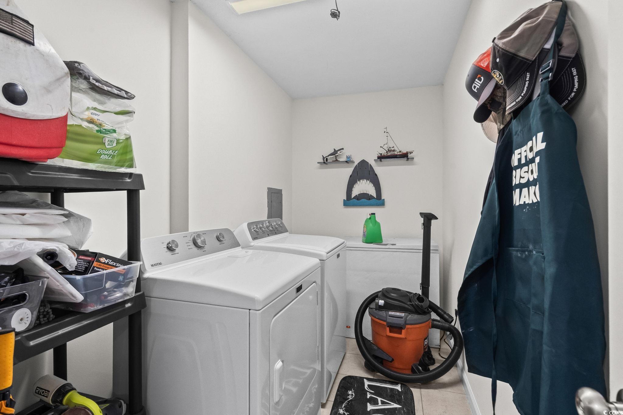 1996 Heritage Road Loris, SC 29569 - Photo 22 of 40 Washroom with separate washer and dryer and tile patterned floors