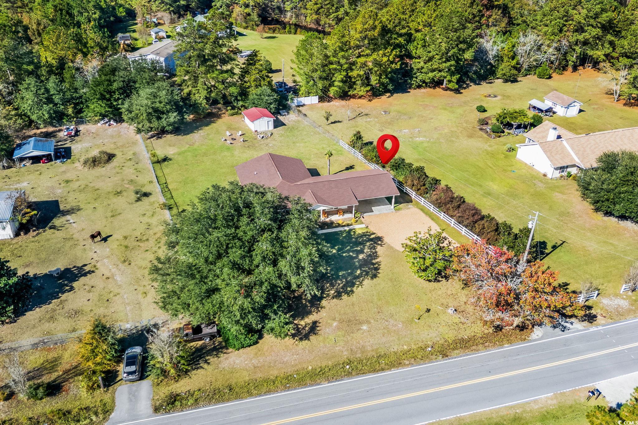 1996 Heritage Road Loris, SC 29569 - Photo 36 of 40 Aerial view of a tree filled landscape