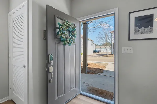 a view of a door and a window