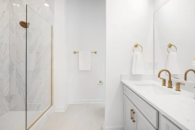 a bathroom with a sink and mirror