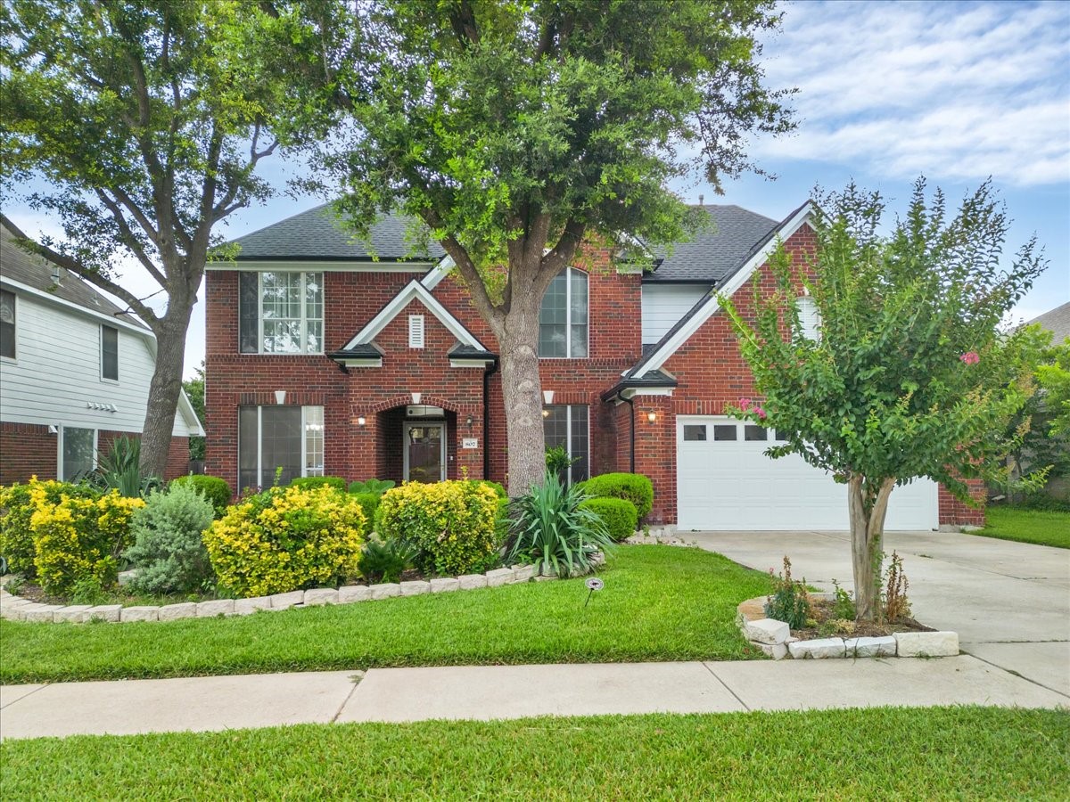 807 Caribou Ridge Trail Pflugerville, TX 78660 - Photo 1 of 1 Mature trees and beautifully landscaped front lawn