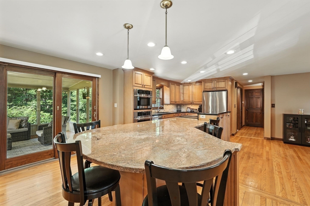 53 Yankee Circle Westfield, MA 01085 - Photo 12 of 42 a view of a dining room with furniture window and wooden floor