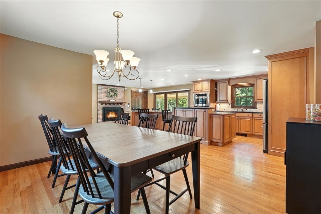 53 Yankee Circle Westfield, MA 01085 - Photo 15 of 42 a view of a dining room with furniture window and wooden floor