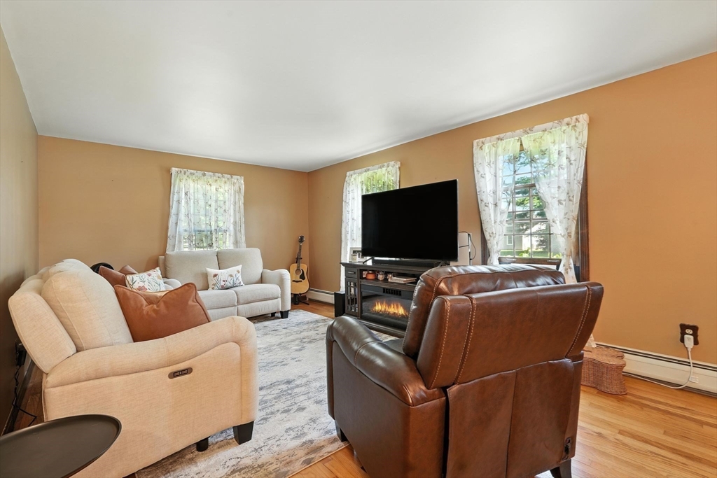 53 Yankee Circle Westfield, MA 01085 - Photo 22 of 42 a living room with furniture and a flat screen tv