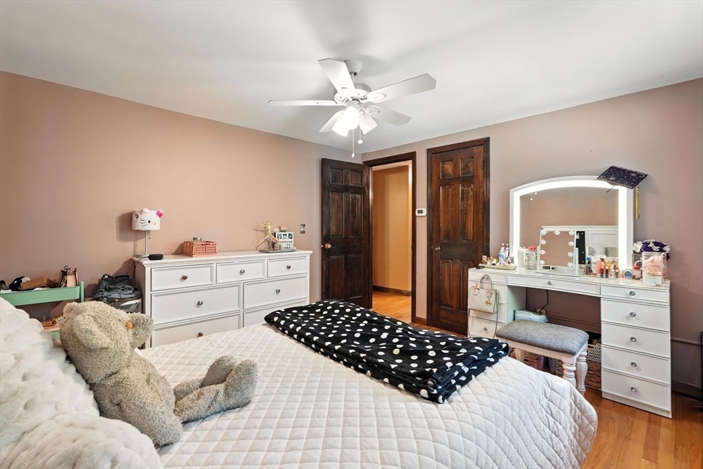53 Yankee Circle Westfield, MA 01085 - Photo 23 of 42 a bedroom with a bed and dresser with mirror