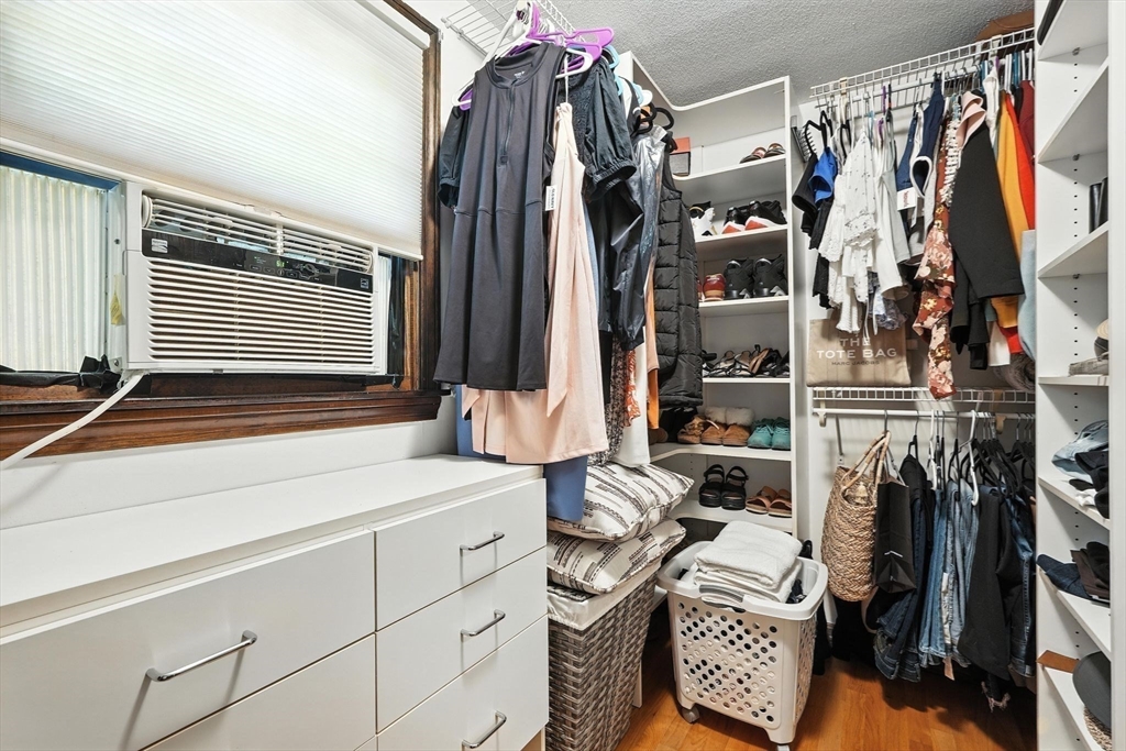 53 Yankee Circle Westfield, MA 01085 - Photo 26 of 42 a view of walk in closet with clothes and shoes