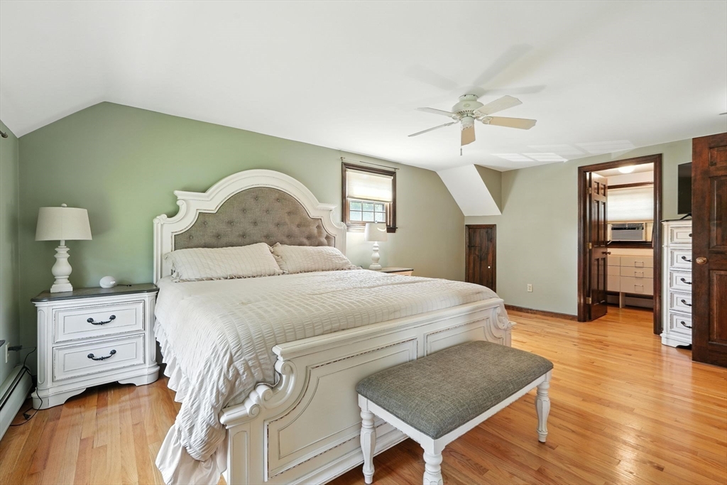 53 Yankee Circle Westfield, MA 01085 - Photo 27 of 42 a bedroom with a bed and wooden floor