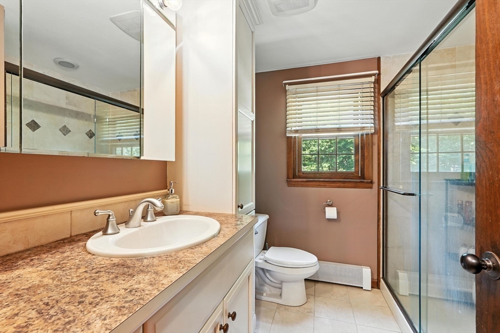 53 Yankee Circle Westfield, MA 01085 - Photo 30 of 42 a bathroom with a granite countertop sink toilet and shower