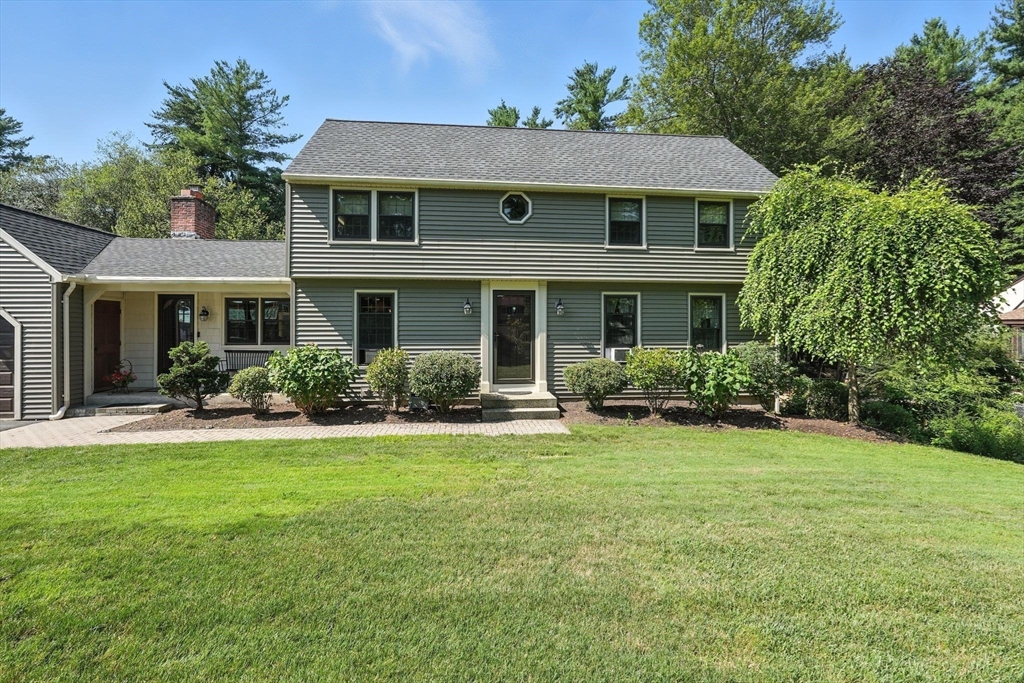 53 Yankee Circle Westfield, MA 01085 - Photo 3 of 42 a front view of a house with swimming pool and porch