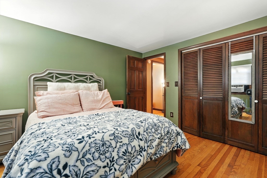 53 Yankee Circle Westfield, MA 01085 - Photo 31 of 42 a bedroom with a large bed and a window