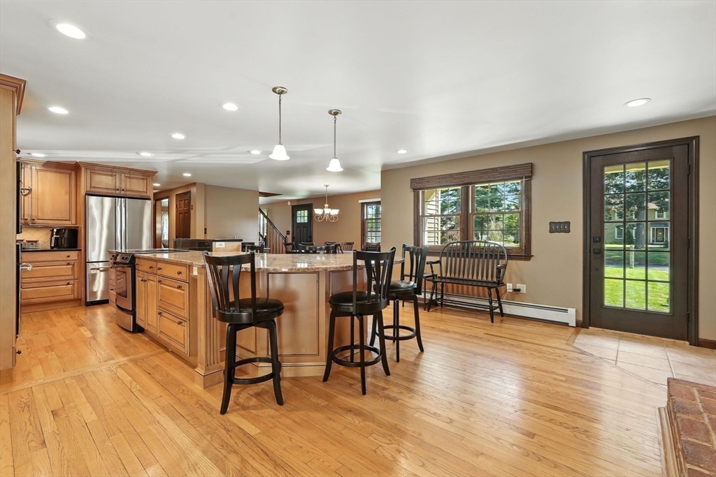 53 Yankee Circle Westfield, MA 01085 - Photo 9 of 42 a view of a dining room with furniture and wooden floor