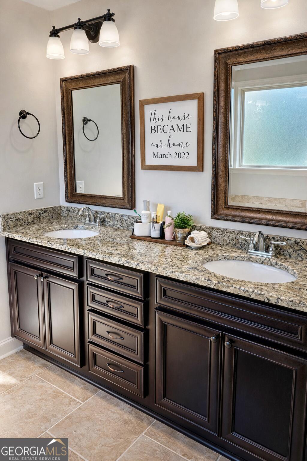 106 Rawlins Point Perry, GA 31069 - Photo 14 of 34 a bathroom with a granite countertop sink and a mirror
