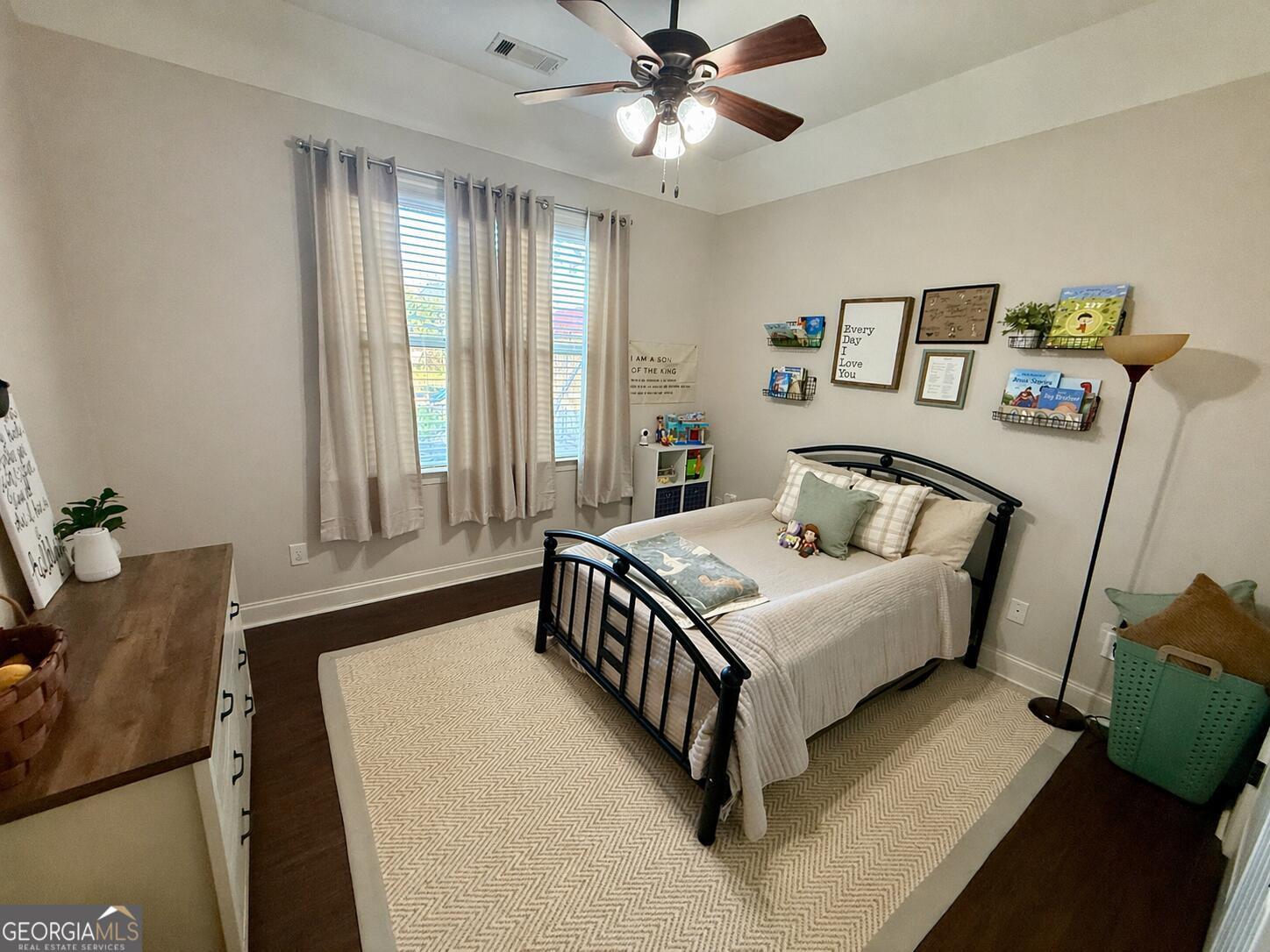 106 Rawlins Point Perry, GA 31069 - Photo 17 of 34 a bedroom with a bed and window