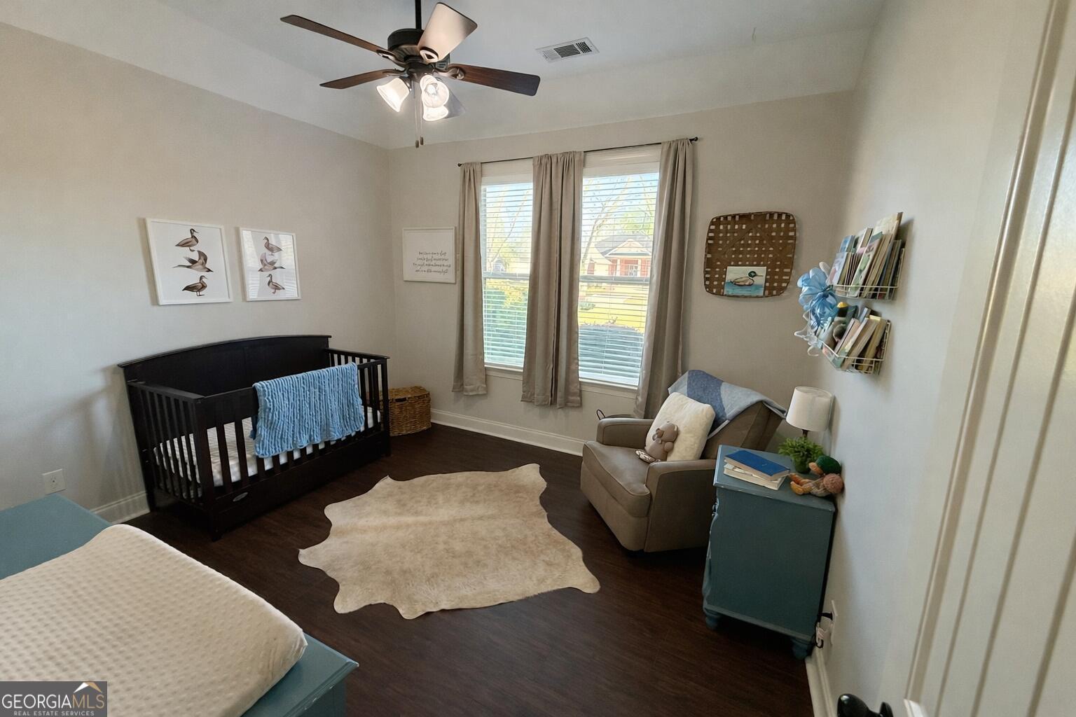 106 Rawlins Point Perry, GA 31069 - Photo 19 of 34 a living room with furniture and a window