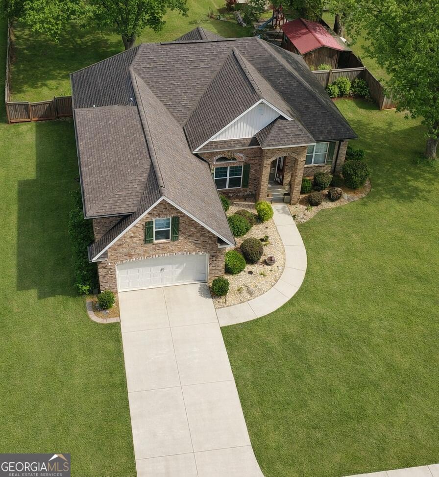 106 Rawlins Point Perry, GA 31069 - Photo 3 of 34 an aerial view of a house
