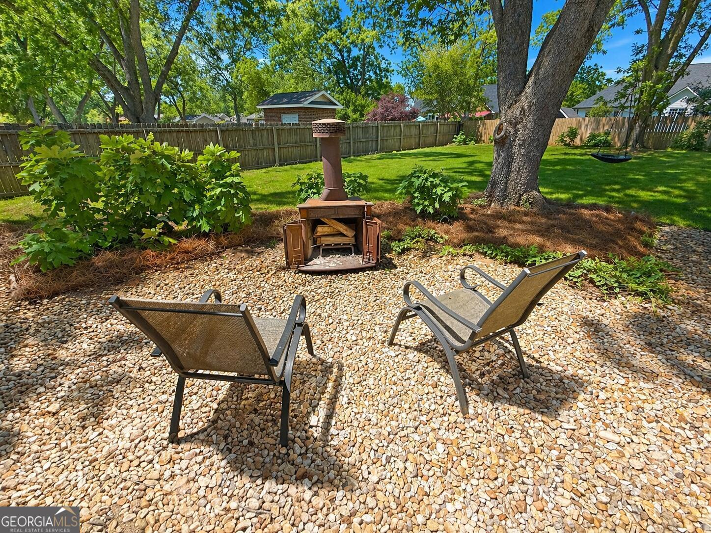 106 Rawlins Point Perry, GA 31069 - Photo 31 of 34 a view of a backyard with sitting area