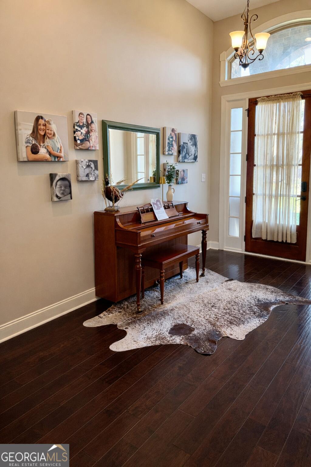 106 Rawlins Point Perry, GA 31069 - Photo 7 of 34 a living room with a couch and a window