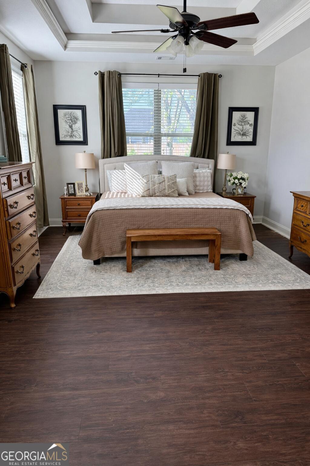 106 Rawlins Point Perry, GA 31069 - Photo 10 of 34 a bedroom with a bed and wooden floor