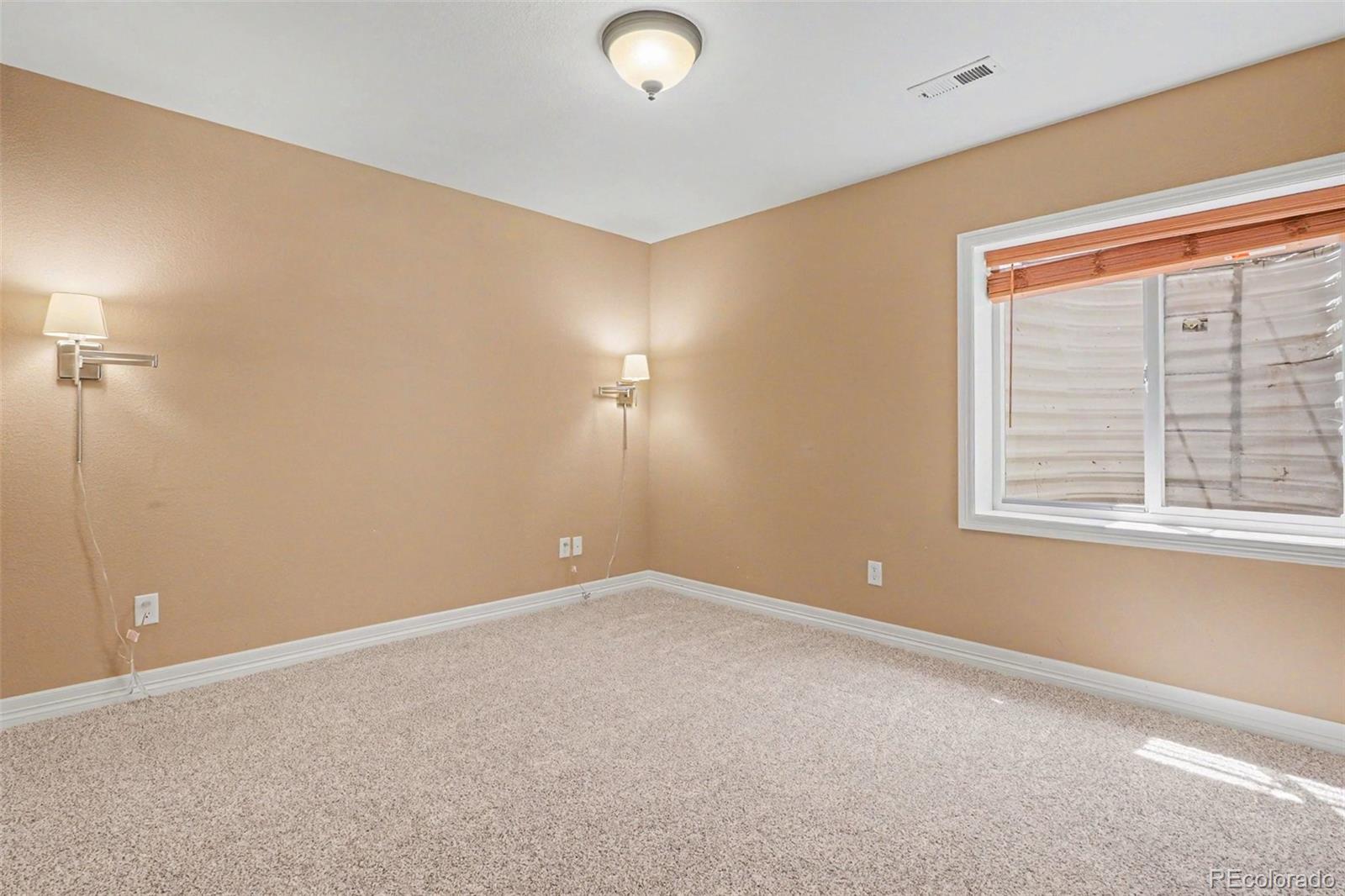 791 Elk Rest Road Evergreen, CO 80439 - Photo 34 of 46 a view of an empty room with a window