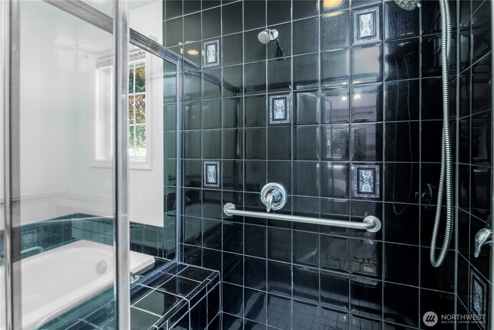 301 Mt Pleasant Estates Road Port Angeles, WA 98362 - Photo 17 of 40 a bathroom with a glass shower door