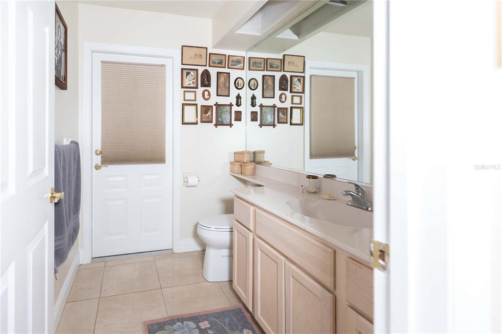 1915 Southwest 40th Place Ocala, FL 34471 - Photo 17 of 20 a bathroom with a sink toilet and shower